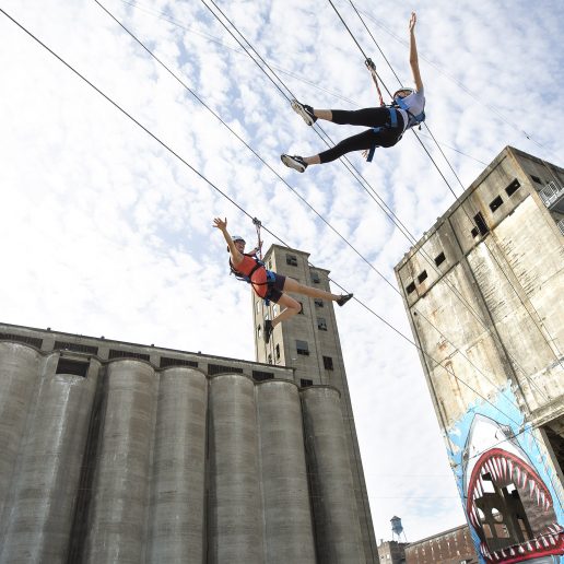 People ziplining