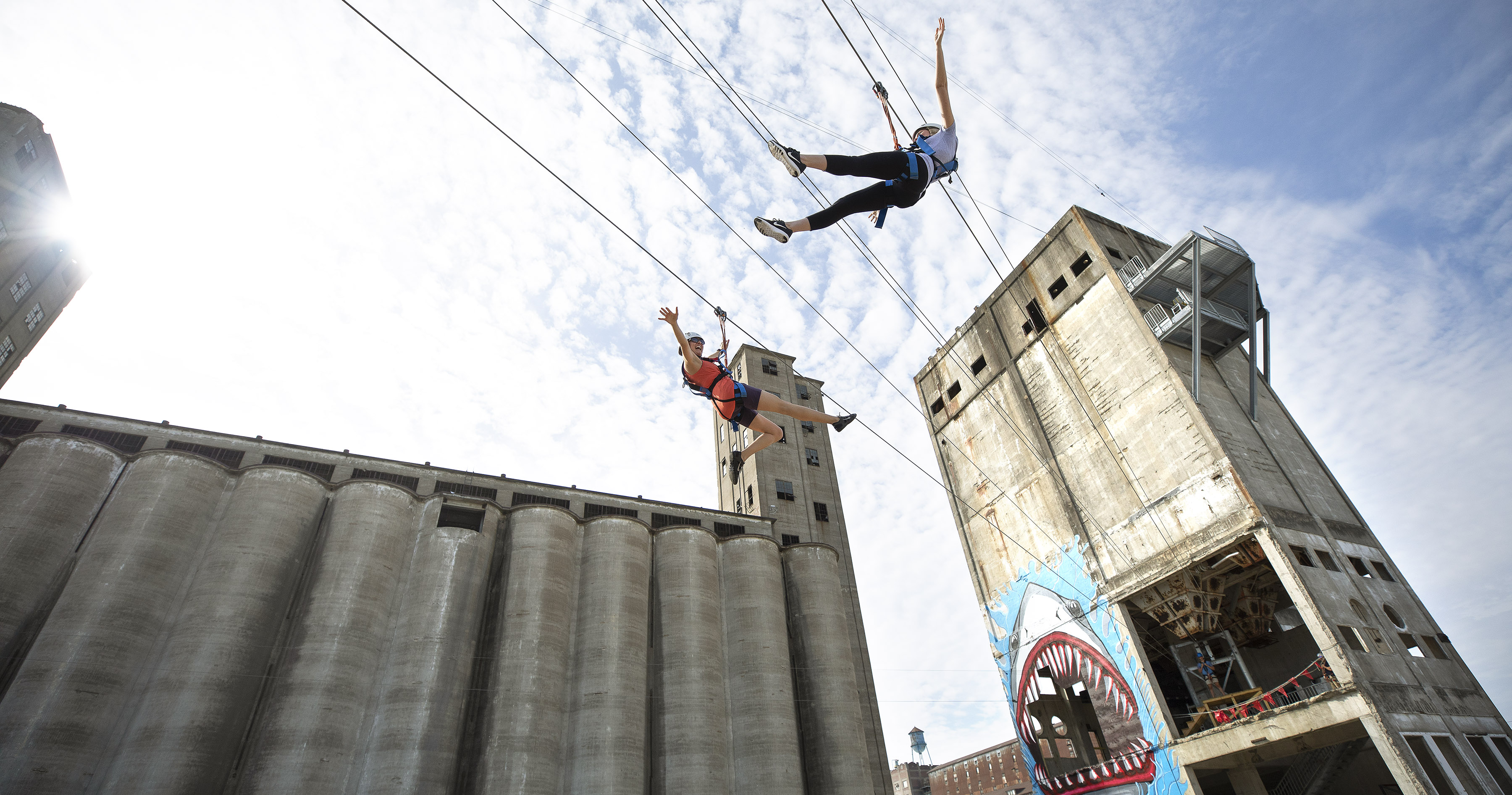 People ziplining