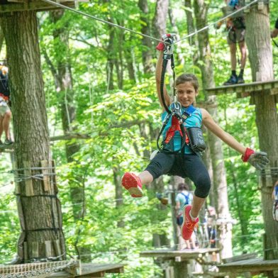 Child ziplining at Sky High Adventure Park