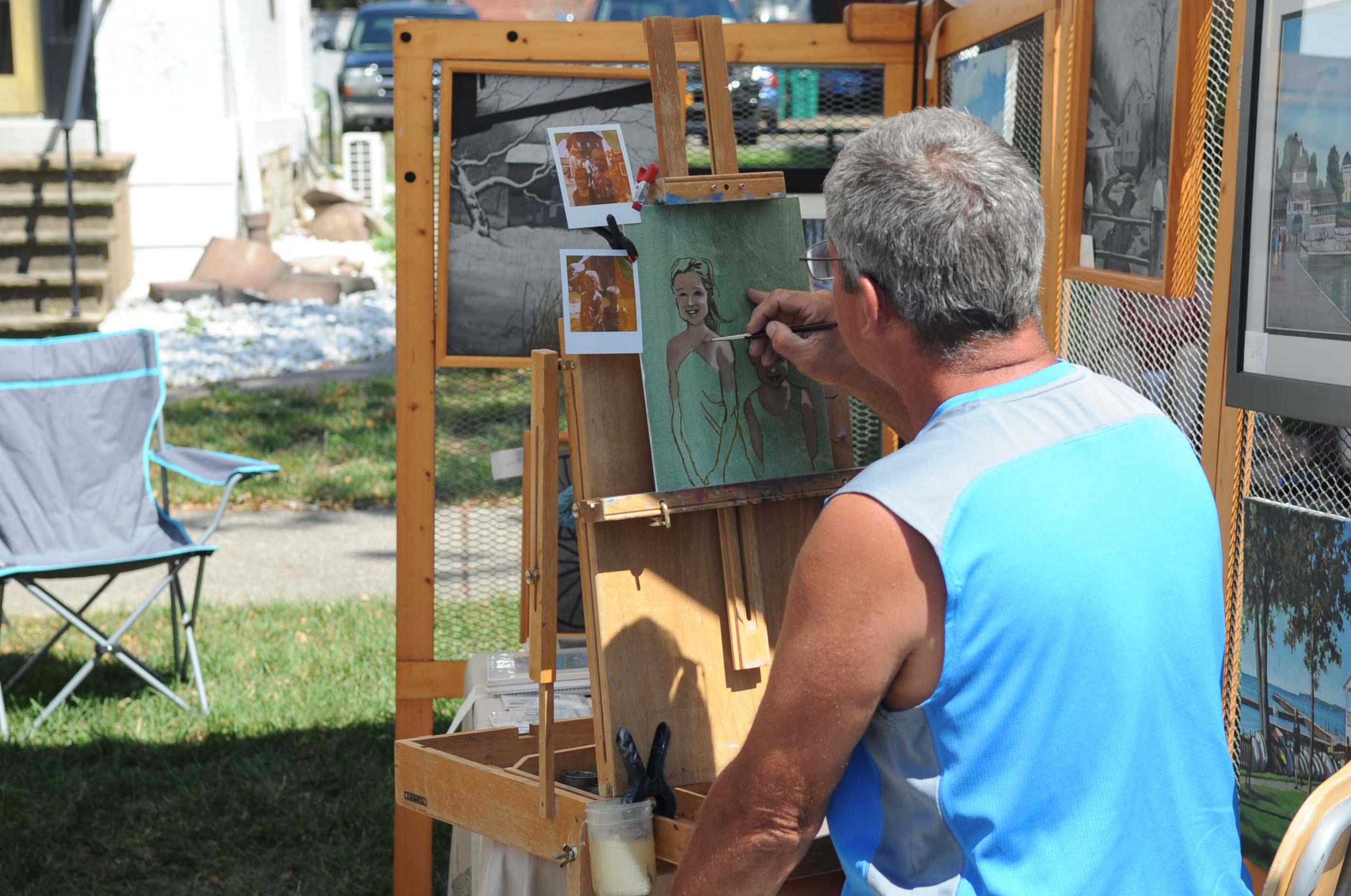 An artist painting at the Allentown Art Festival